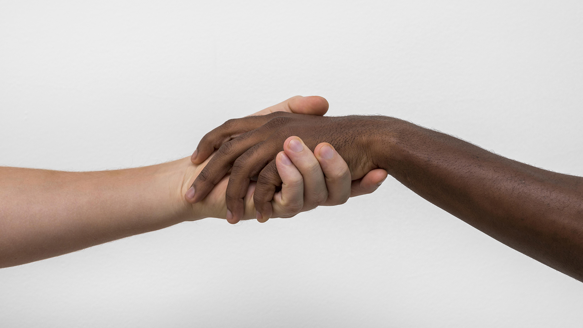 multiracial-hands-coming-together copy