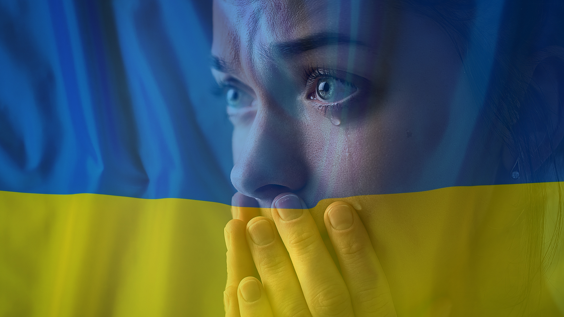 Ukraine Sad desperate grieving crying woman with folded hands and tears