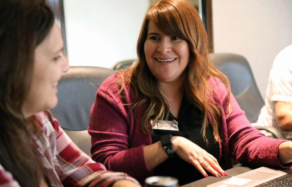 Assoc. Director of Advising Kathryn Moraga helps a student