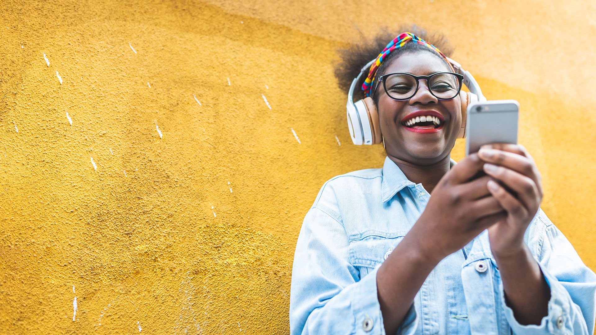 happy african american with mobile phone