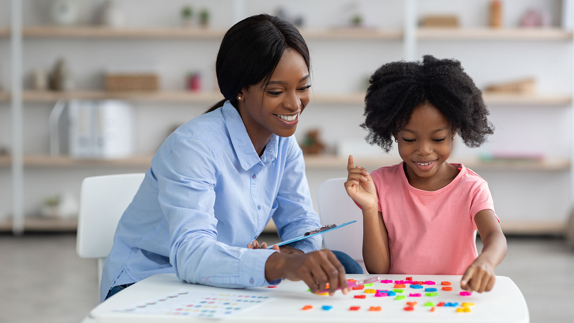 Woman plays with her daughter