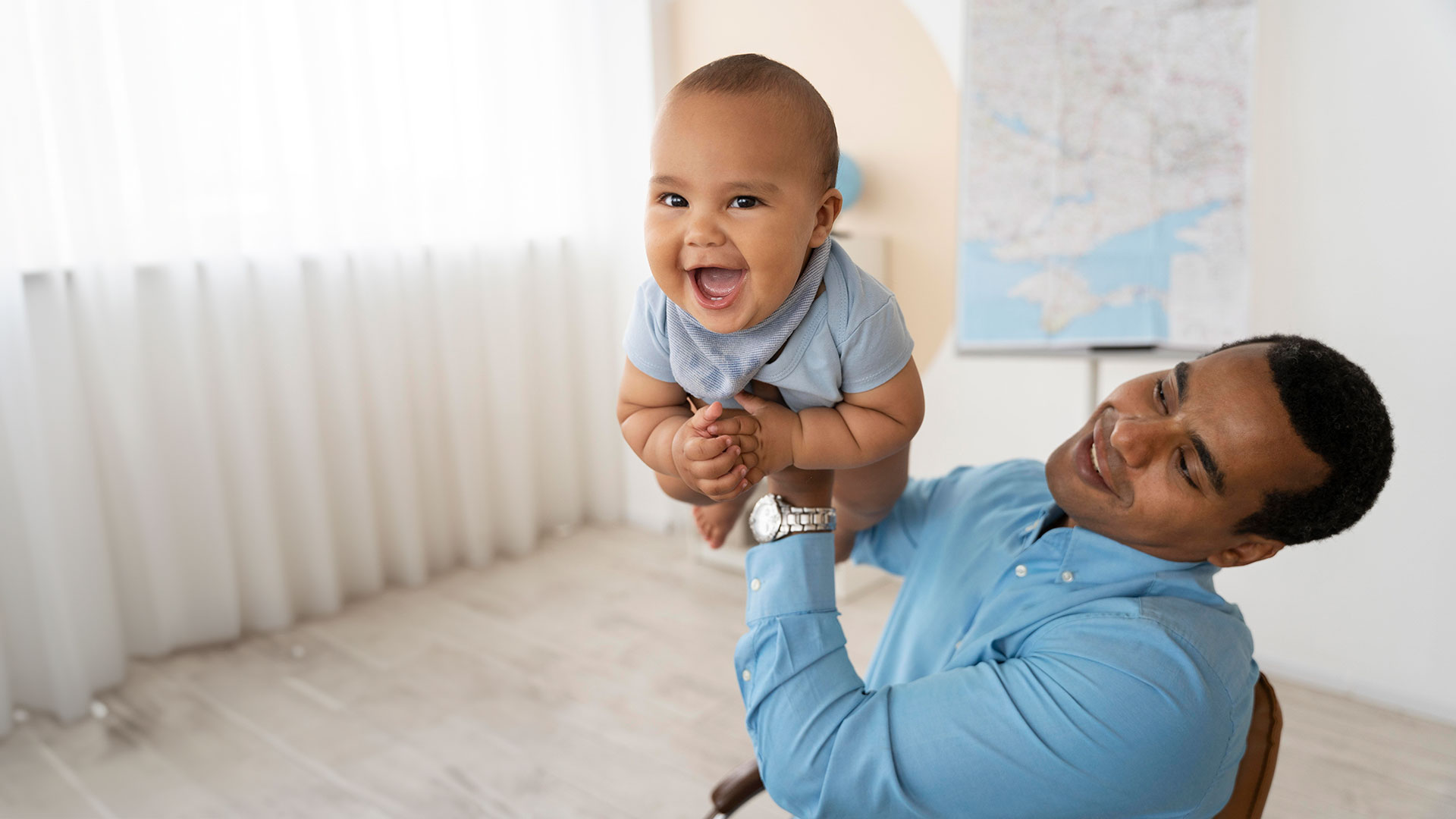 parent playing with baby